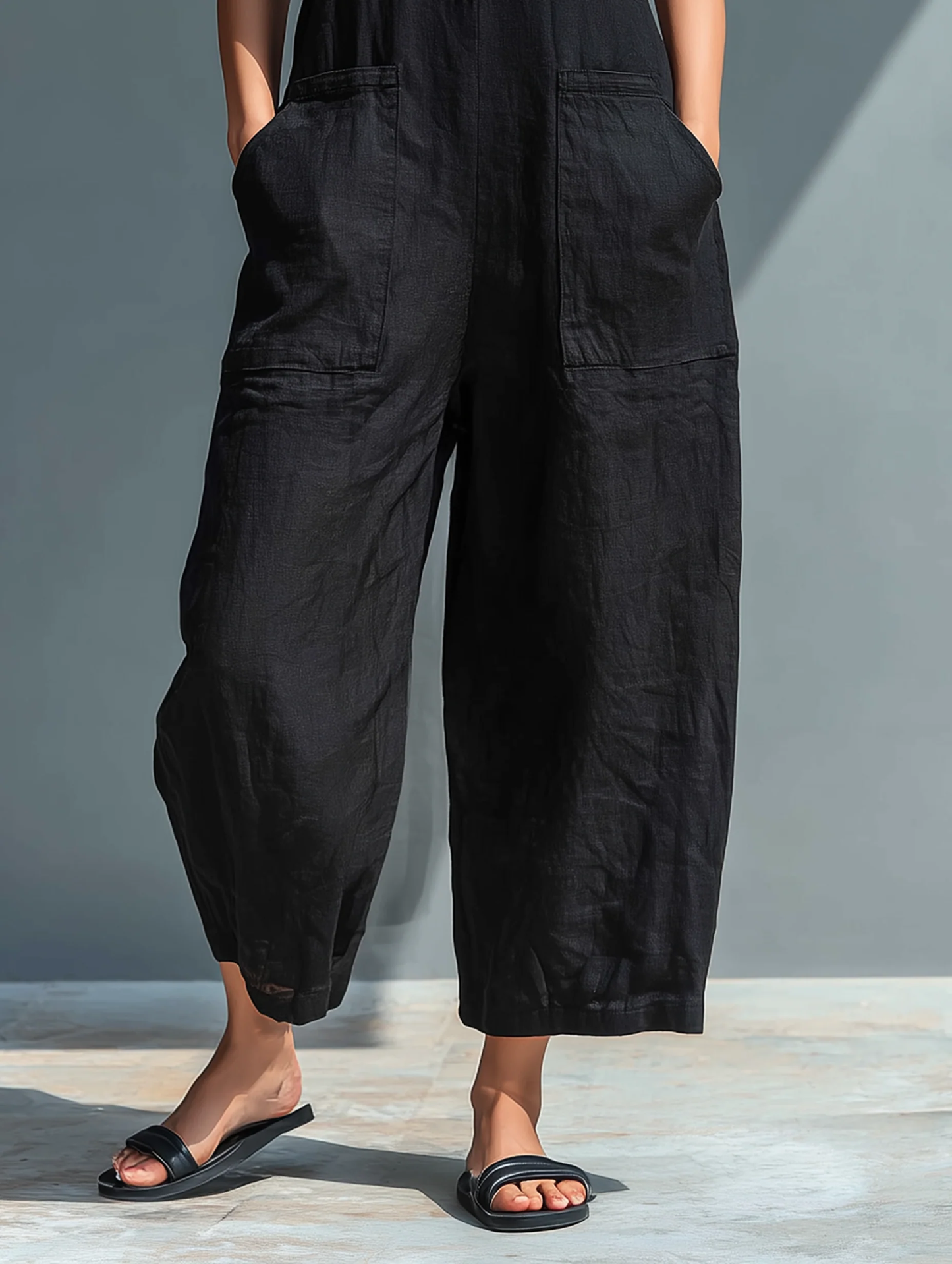 FERN | SLEEVELESS JUMPSUIT WITH POCKETS AND BUTTONS
