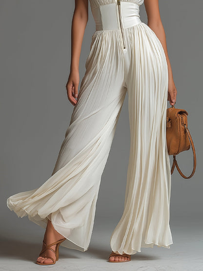 SADIE | PLEATED JUMPSUIT WITH ZIP AND WAISTBAND